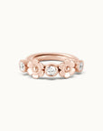 18k rose gold piercing ring with floral design and diamond accents for ear, nose, or navel