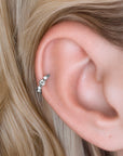 18k gold ear cuff with floral design and clear stones, elegant piercing jewelry for women