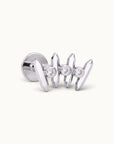 18k gold ear piercing with three diamond accents and geometric prong design