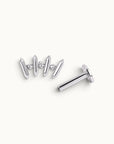 18k gold piercing jewelry with geometric design and small gem accents, ideal for ear or nose piercings