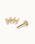 18k gold ear piercing jewelry with geometric spikes and diamond accents, handmade luxury body jewelry