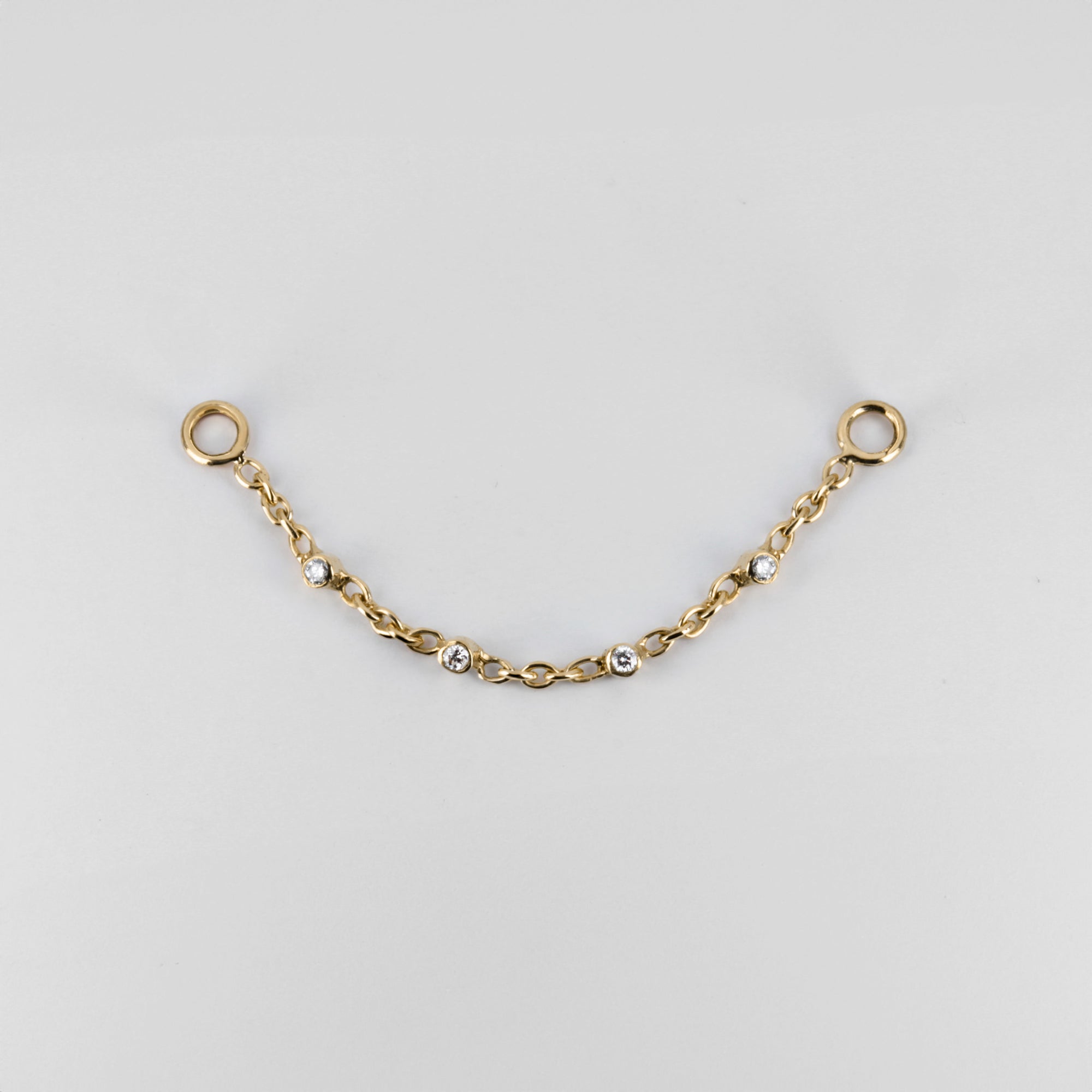 Piercing chain in 18K rose gold set with G-VS diamonds – fine handmade jewelry