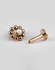 Circular beaded ear piercing in 18k rose gold with pearl