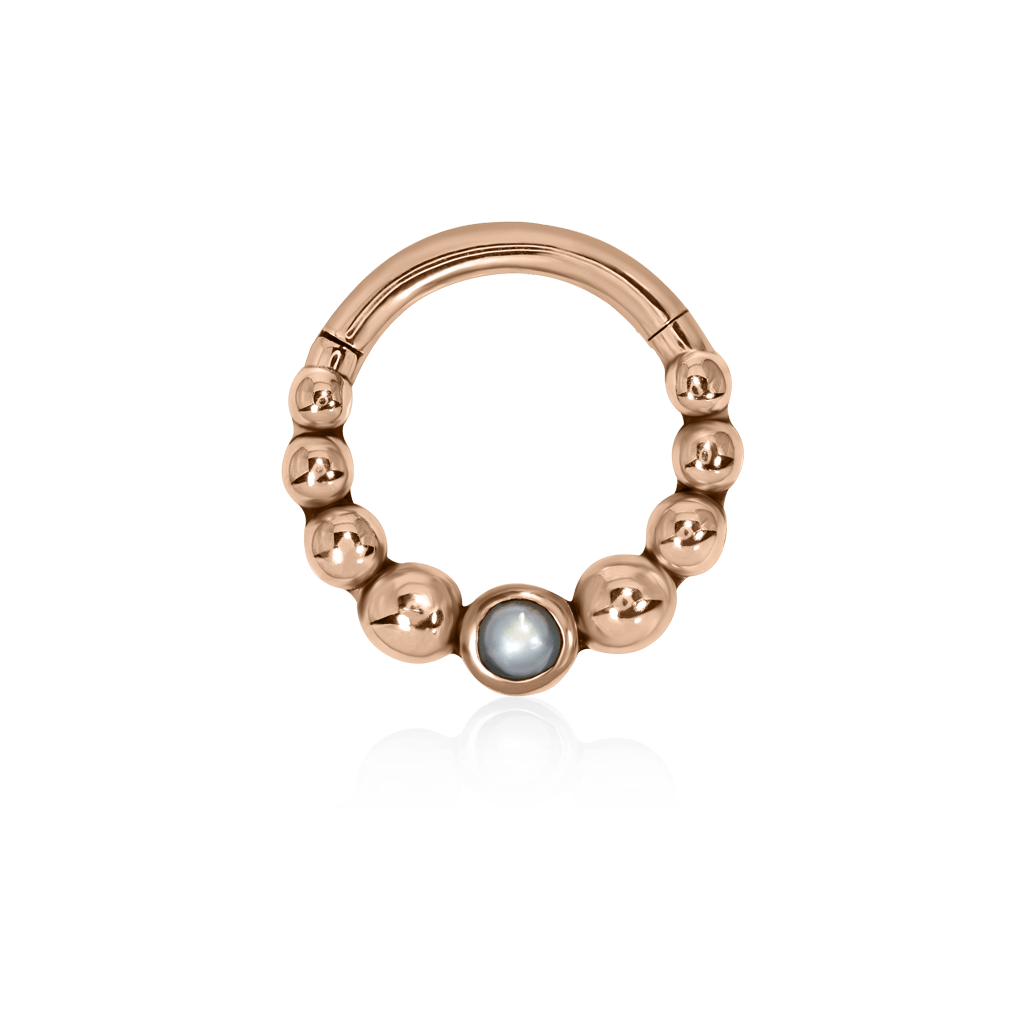 Front-facing 18k rose gold piercing ring with beads and pearl