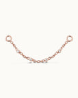 18k rose gold piercing chain with diamond accents, luxury body jewelry for ear or nose