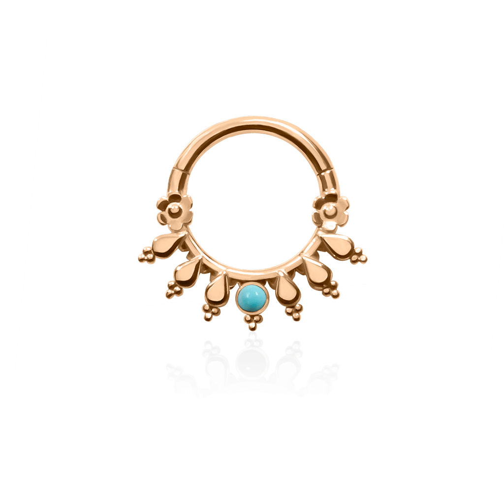 Front-facing 18k yellow gold piercing ring with turquoise