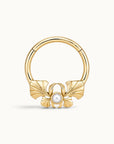 18k gold clicker hoop piercing with a pearl and ginkgo leaf design
