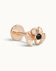18k rose gold ginkgo leaf piercing stud with a black stone and a small diamond