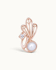 18k rose gold piercing jewelry with a white pearl and a diamond in a wing-like design