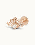 Rose gold lotus flower stud piercing with a central white pearl
