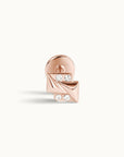 Rose gold ear piercing with four sparkling stones, luxury 18k gold body jewelry for elegant style