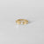 Detail of Anneau Baya hoop piercing, sleek yellow gold finish handmade in Paris