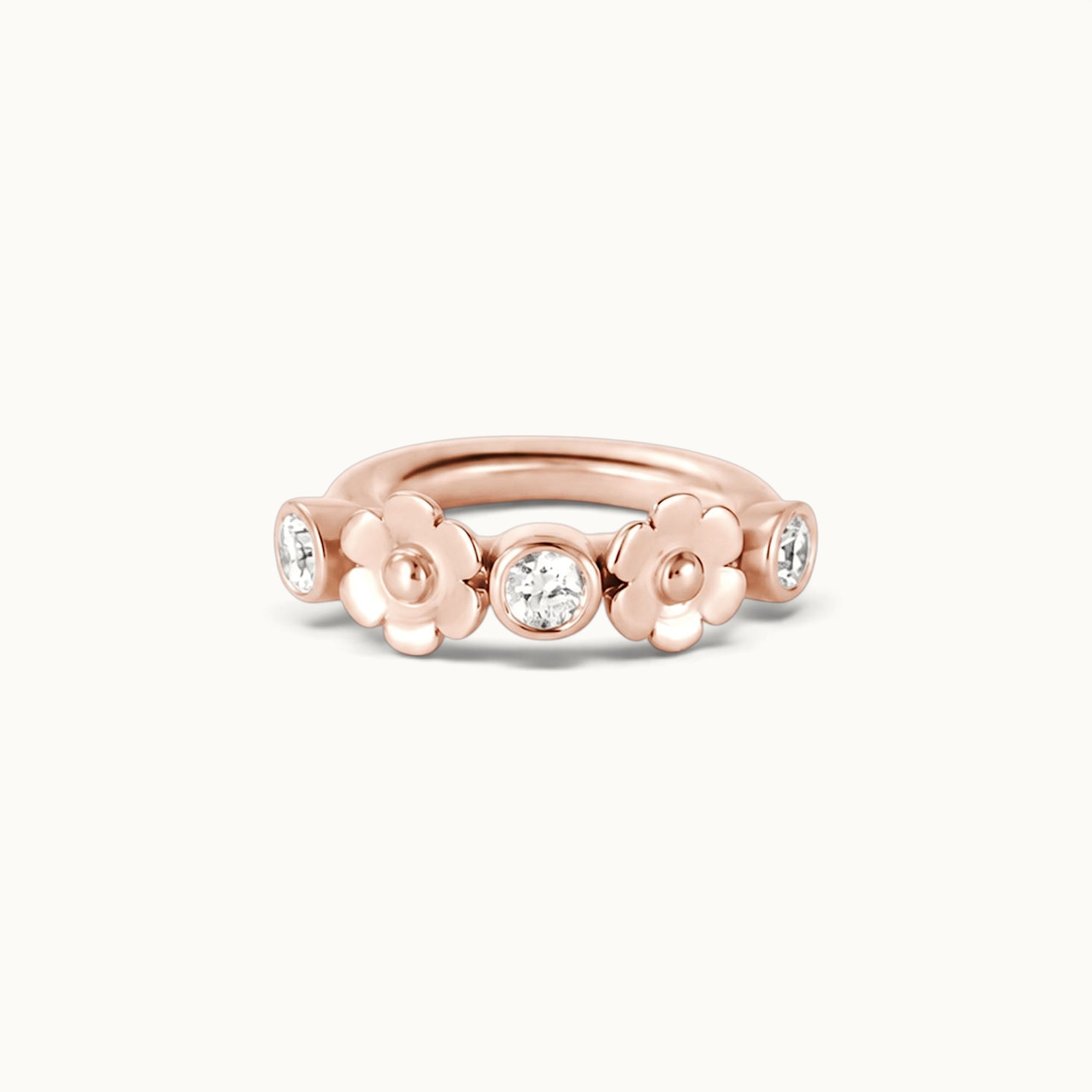 18k rose gold piercing ring with floral design and diamond accents for ear, nose, or navel