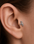 Delicate leaf-shaped ear piercing jewelry with diamond accent, crafted in 18k gold for elegant style.