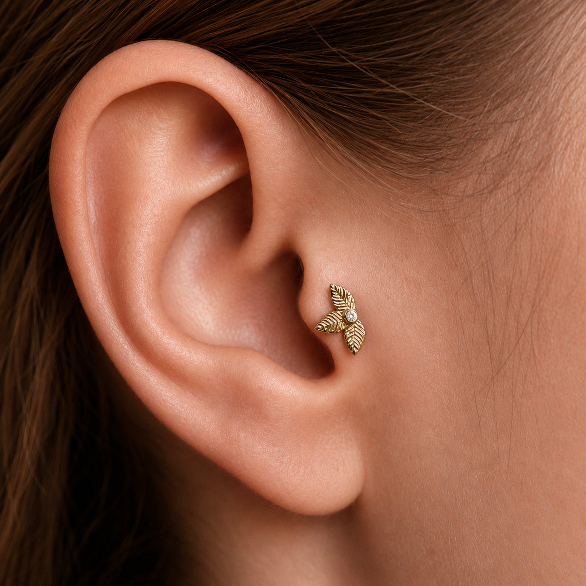18k gold leaf ear piercing jewelry with diamond accent, elegant body jewelry for women