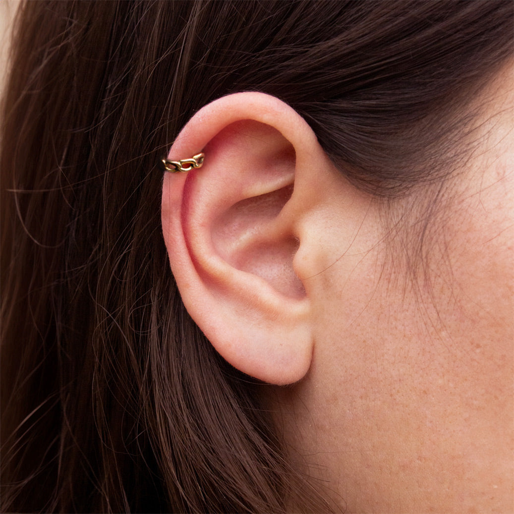 Chunky and bold cuban link piercing ring in 18k yellow gold ...