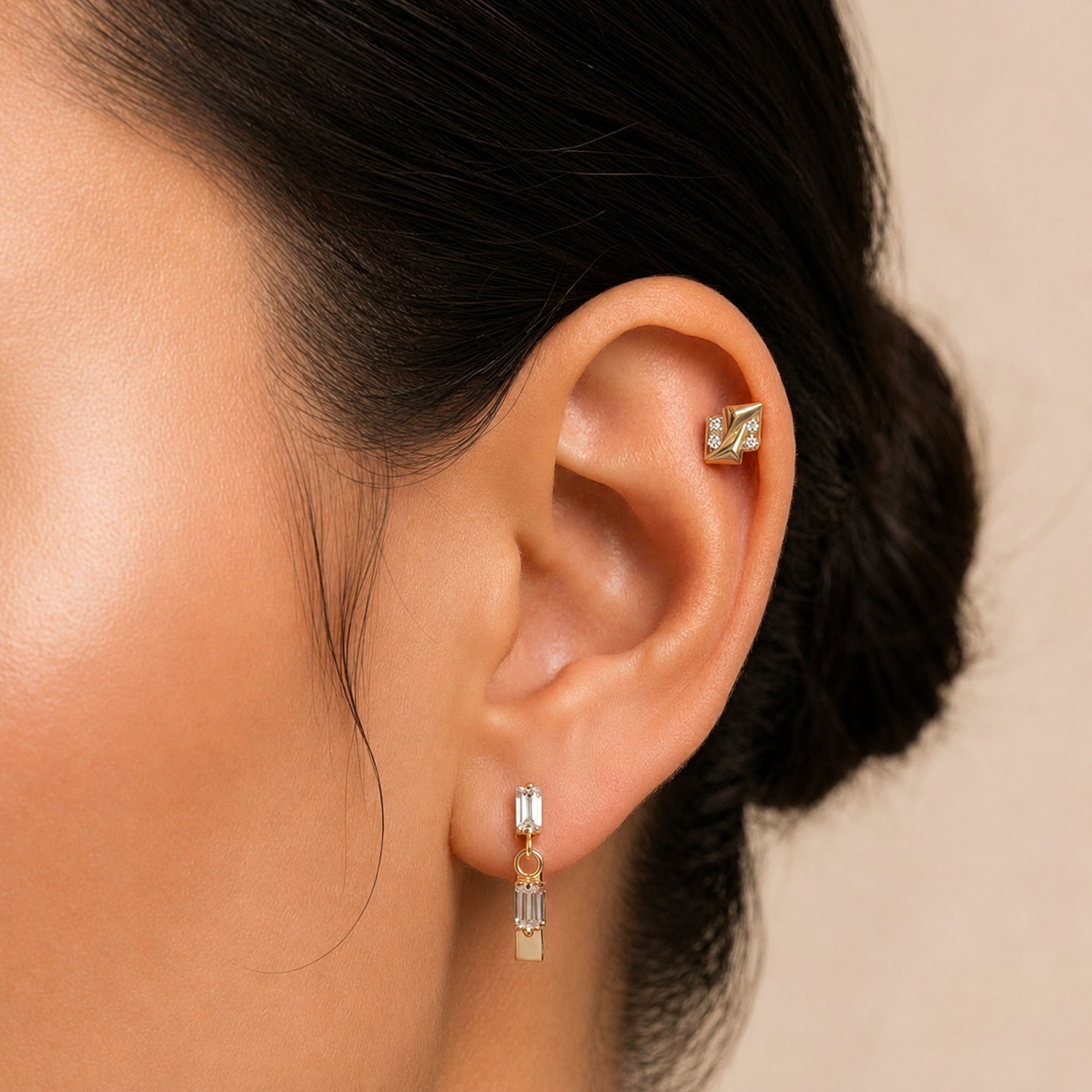 18k gold ear piercing jewelry with baguette and round diamonds, elegant luxury body jewelry for ear