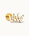 18k gold piercing jewelry with three diamonds and geometric design