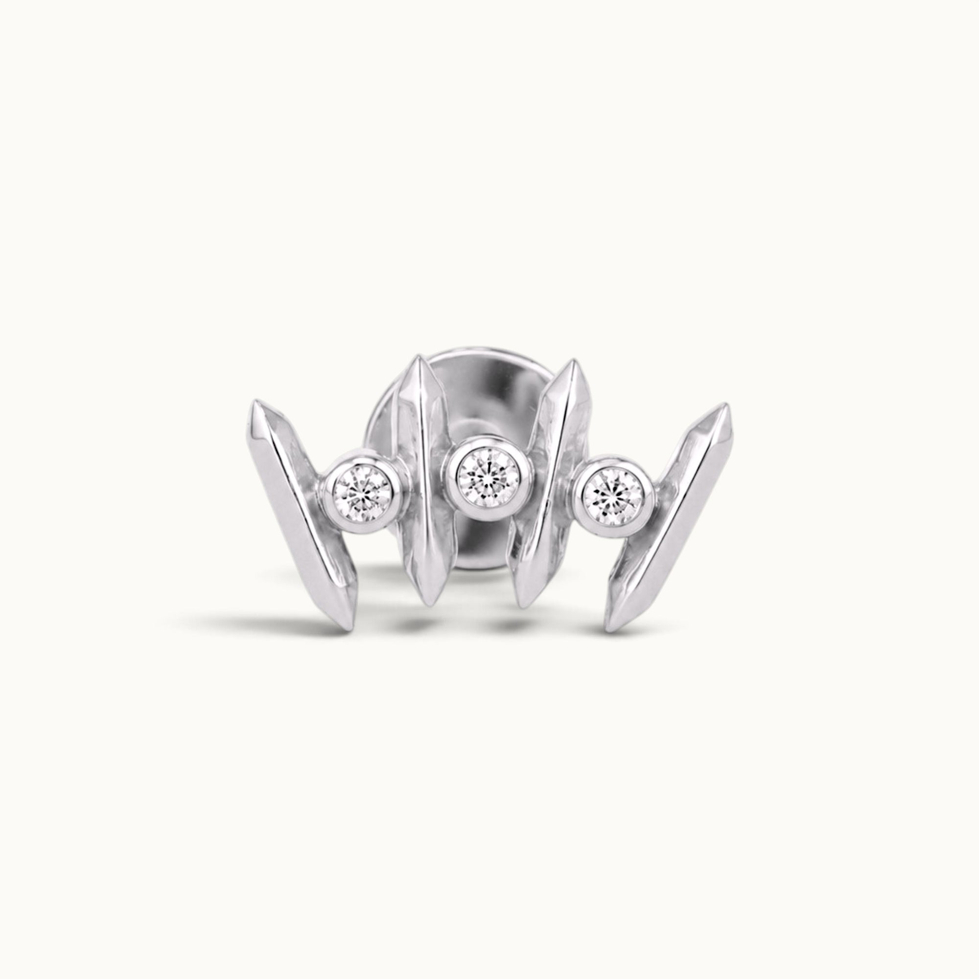 18k gold piercing jewelry with three round diamonds, sleek modern design for ear or nose