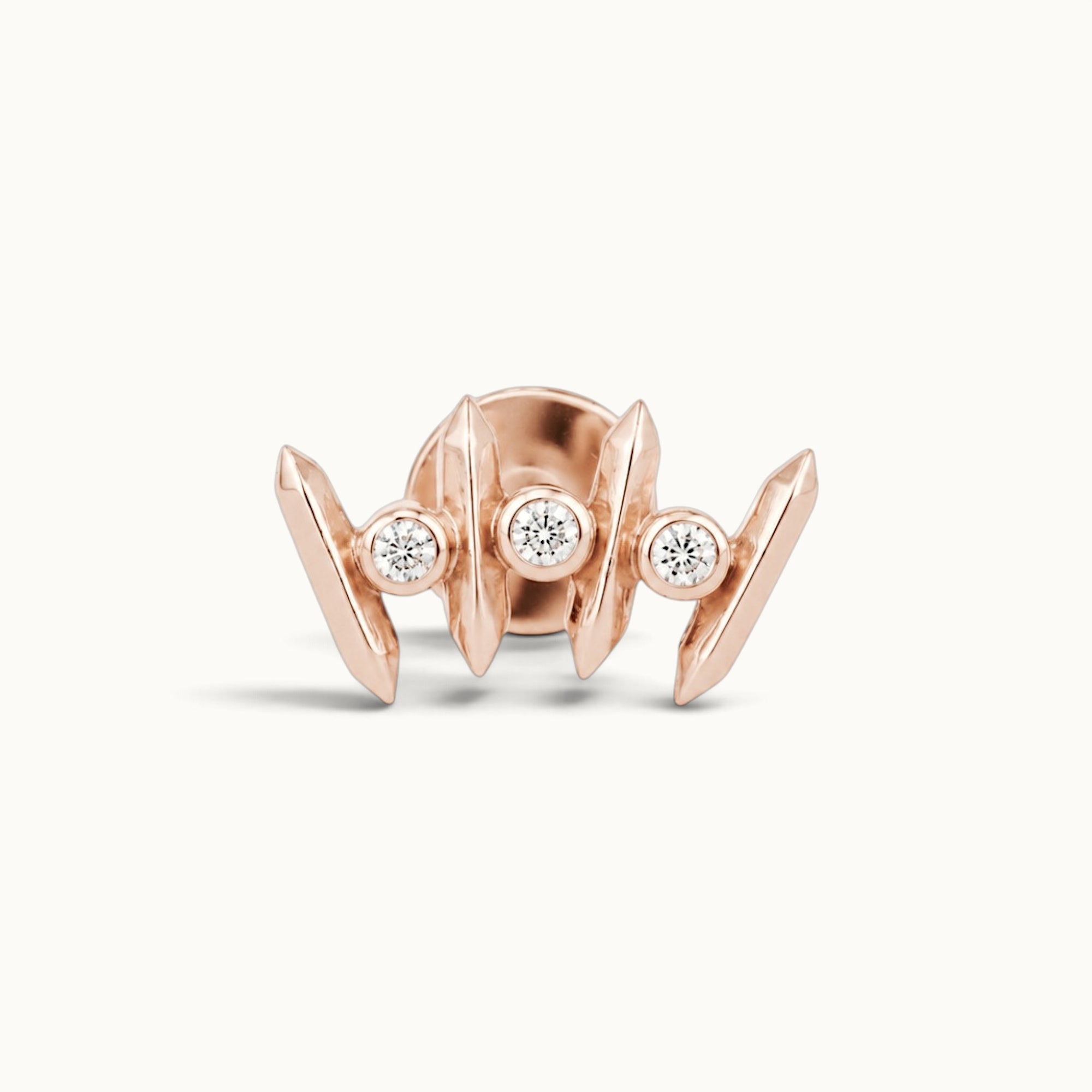 18k rose gold piercing jewelry with three diamonds, elegant and luxurious design