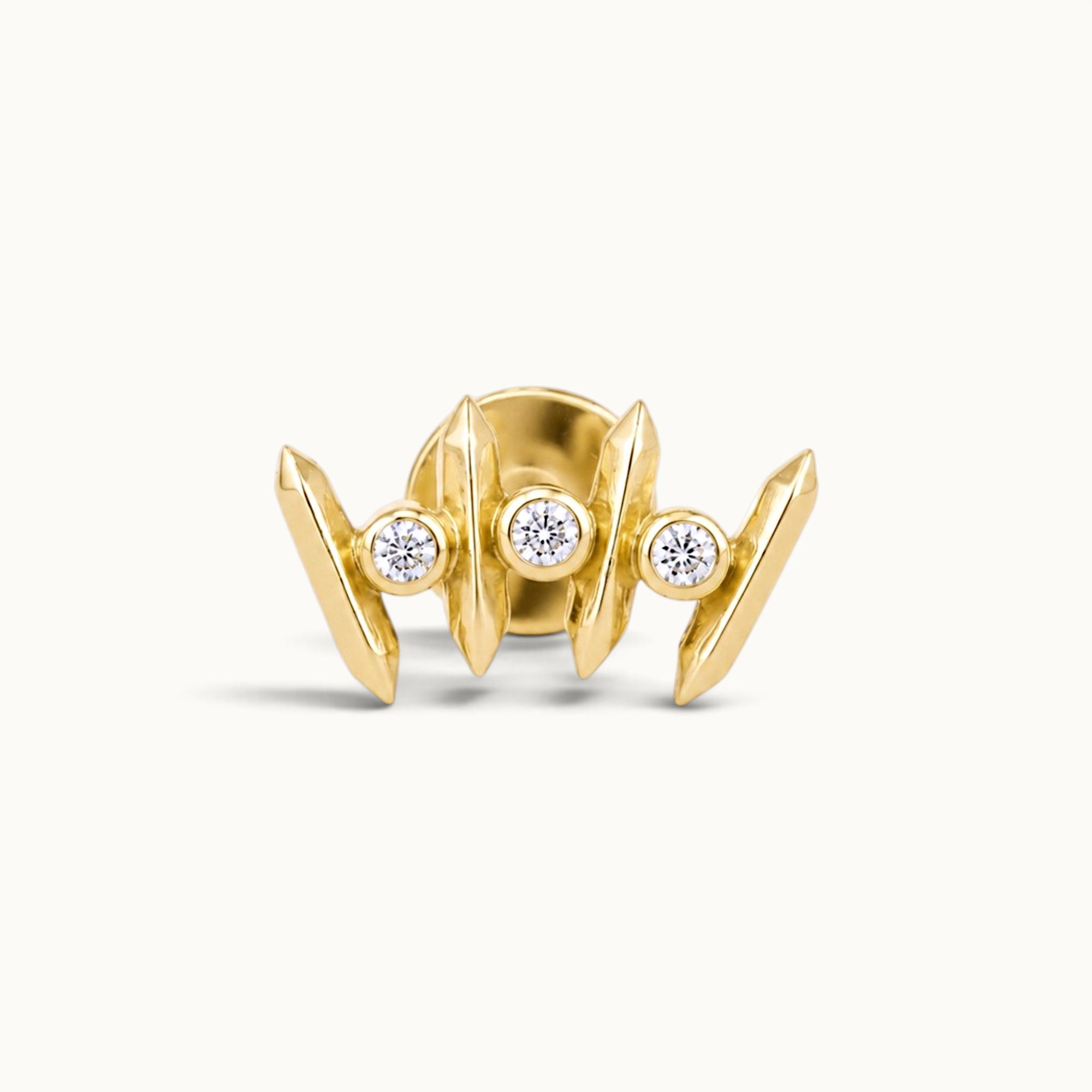 18k gold piercing jewelry with three diamonds, elegant and timeless design for ear or nose