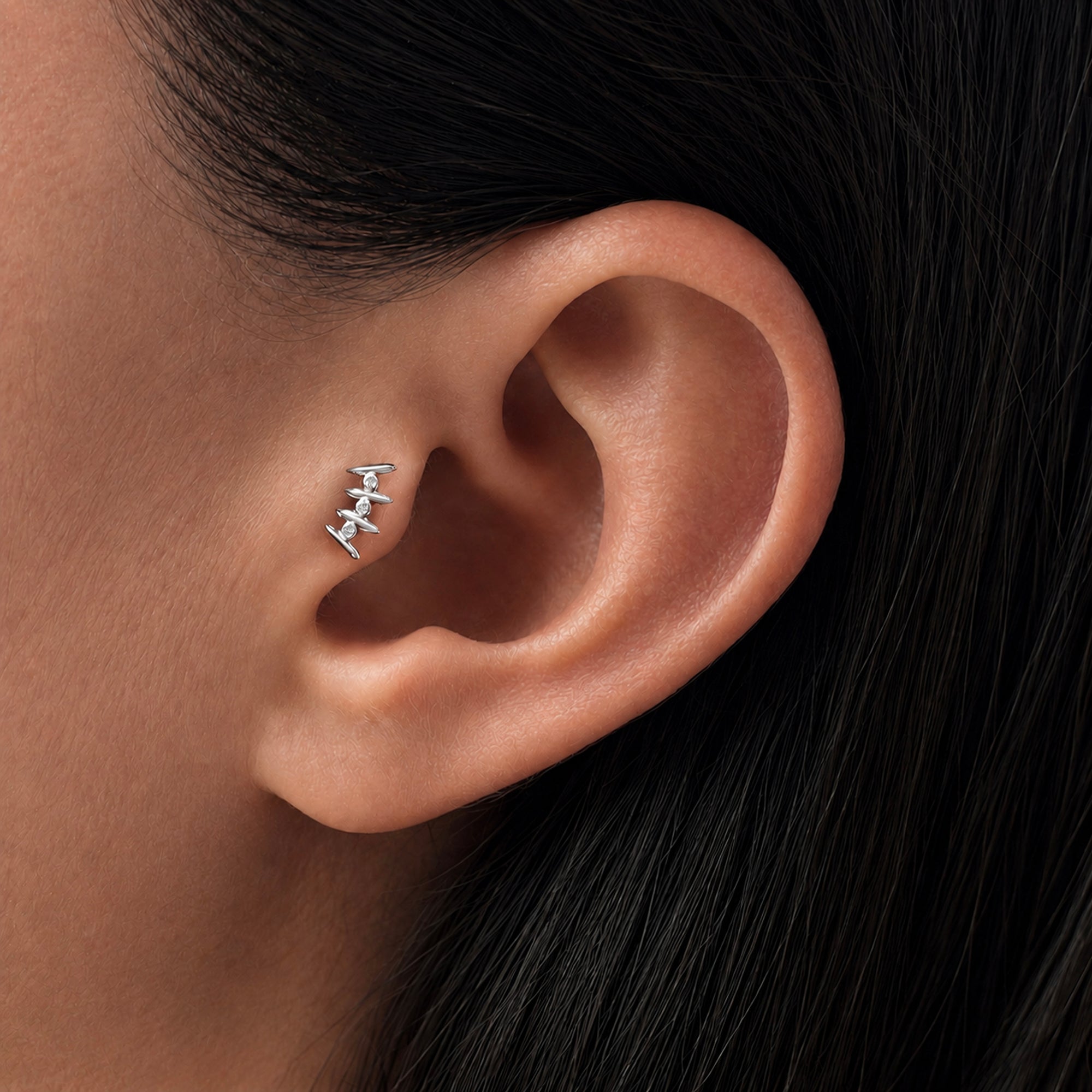 Delicate 18k gold ear piercing with diamond accents, elegant helix jewelry for minimalist style