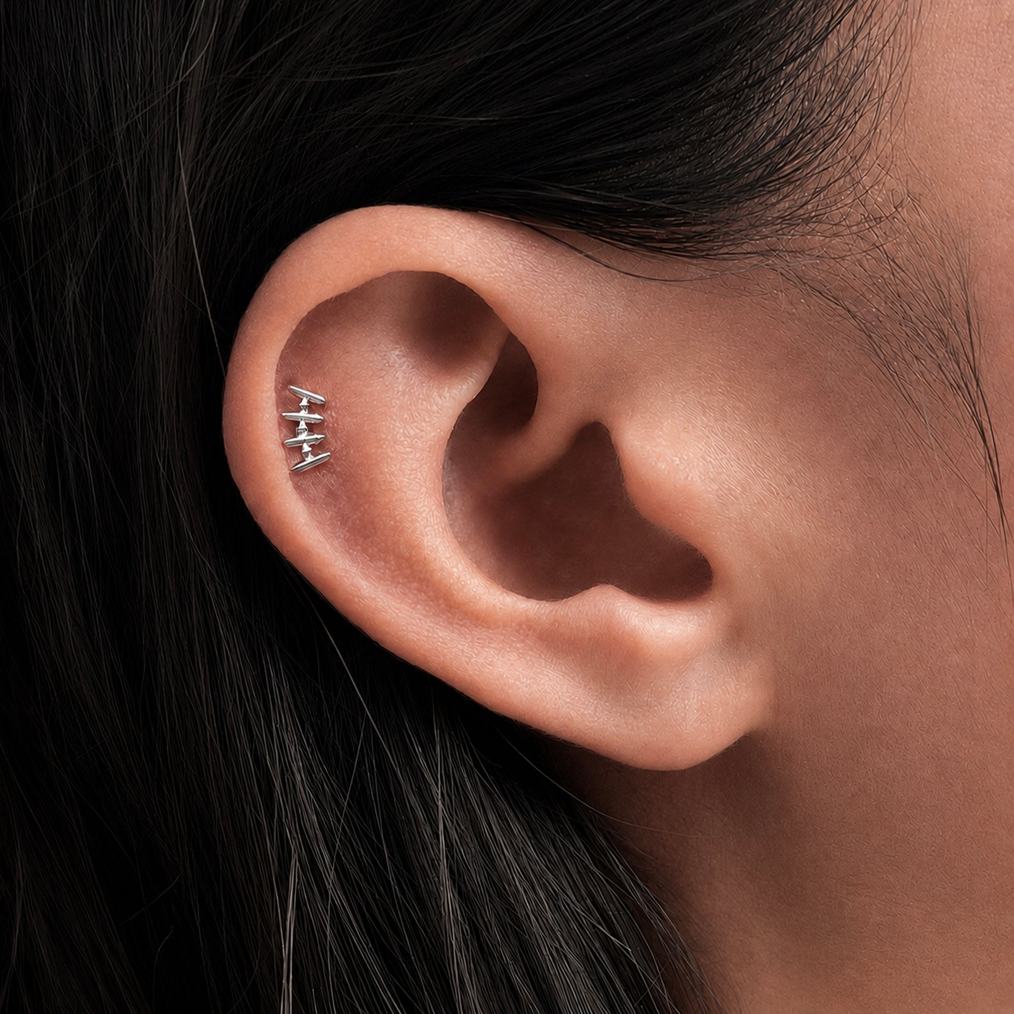 Delicate 18k gold ear piercing jewelry with geometric design, handmade luxury body jewelry for elegant style