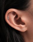 Delicate 18k gold ear piercing jewelry with geometric design, handmade luxury body jewelry for elegant style