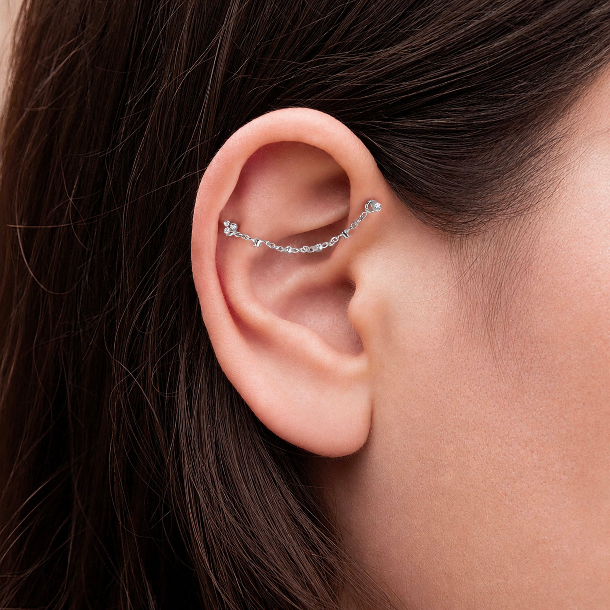 Delicate 18k gold ear climber with diamond accents, elegant piercing jewelry for women
