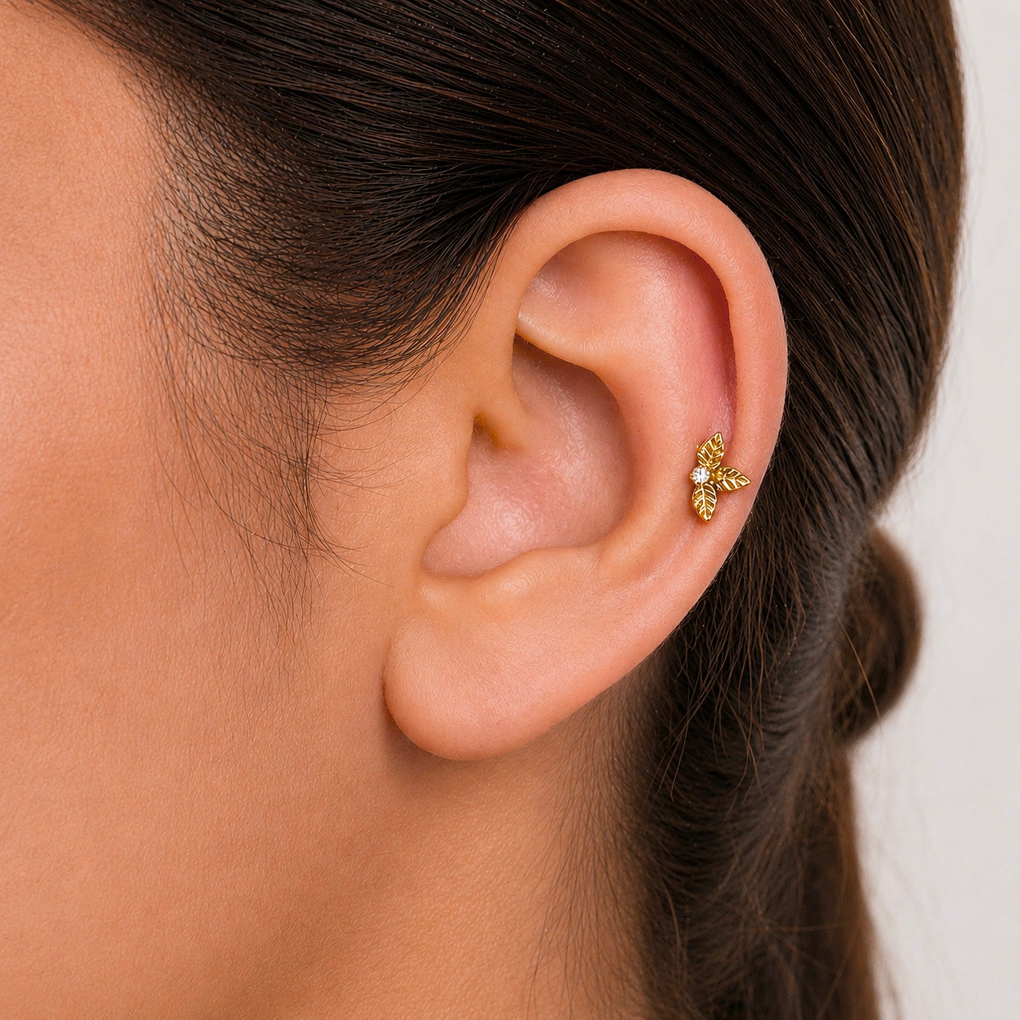 18k gold leaf ear piercing with diamond, luxury body jewelry for elegant style