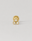 18k gold piercing earring with three diamond accents, luxury body jewelry