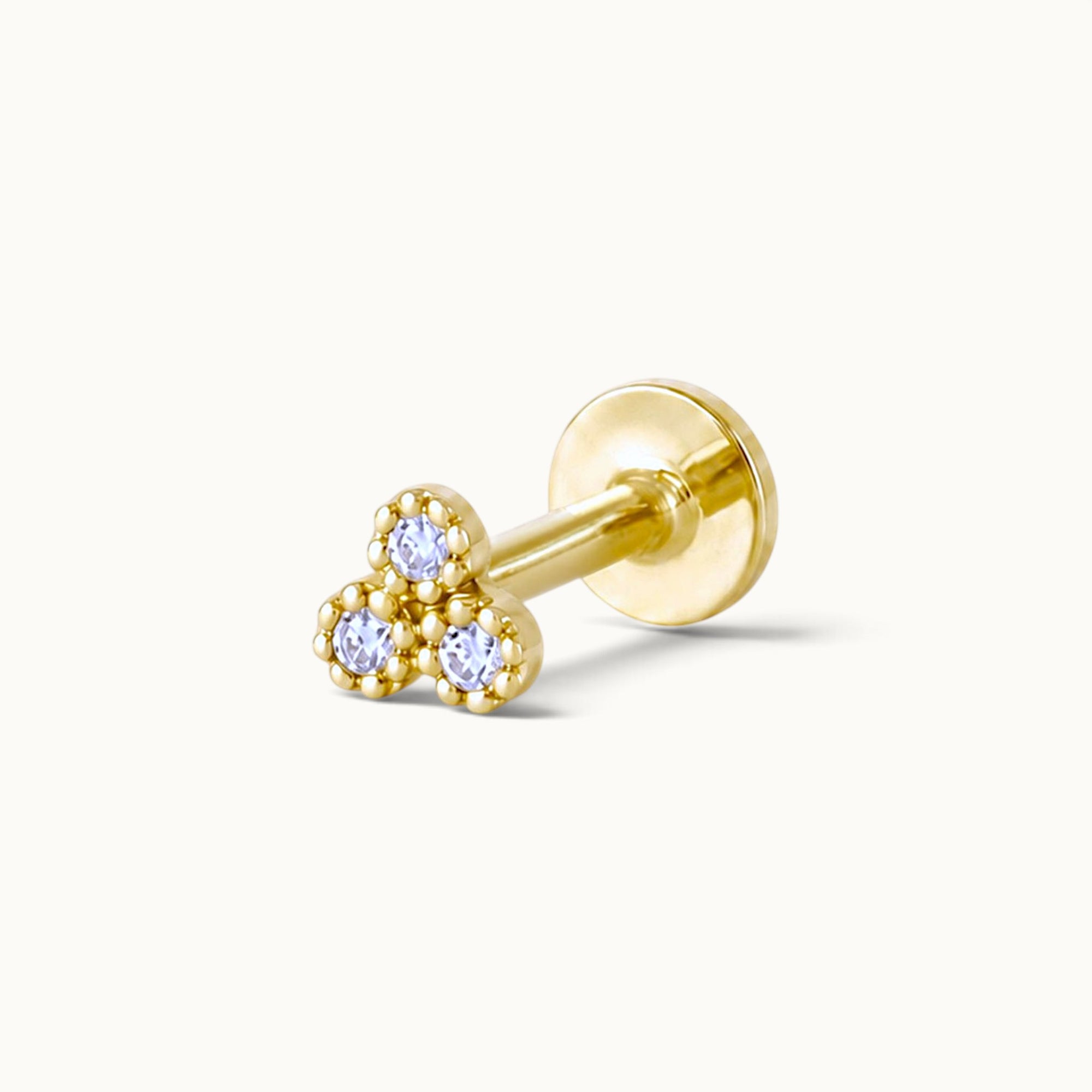 18k gold stud earring with three light blue gemstones, luxury piercing jewelry for ear or nose