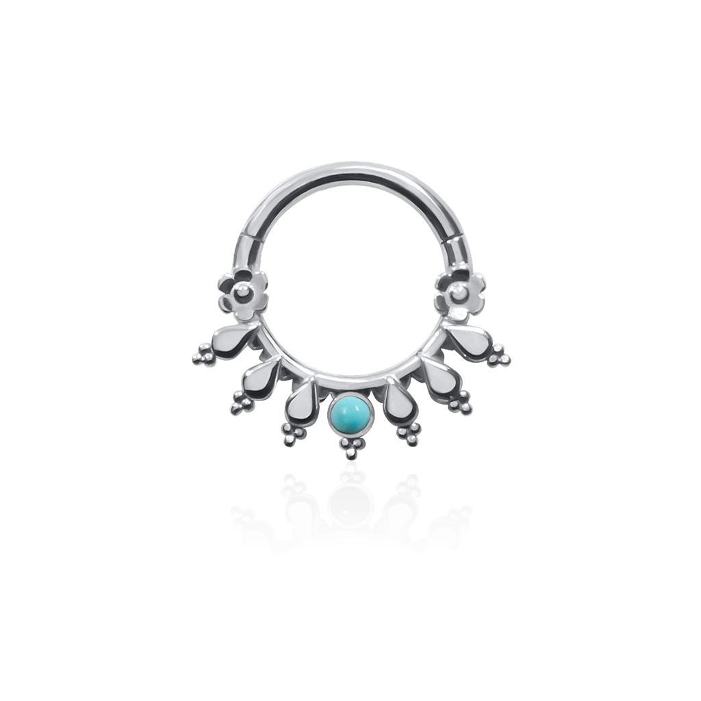 Front-facing 18k white gold piercing ring with turquoise