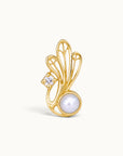 18k gold piercing stud featuring a white pearl, a diamond, and an ornate wing design