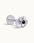 Silver shell-shaped piercing stud with a black gemstone and diamond accent