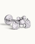 Silver piercing stud featuring a pearl and ornate wing design