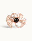 Rose gold ginkgo leaf piercing jewelry with black onyx and diamond