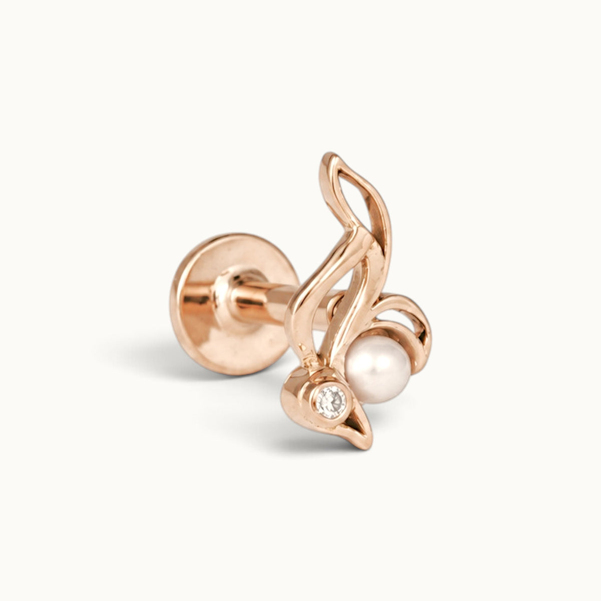 18k rose gold piercing stud with a pearl and diamond accent