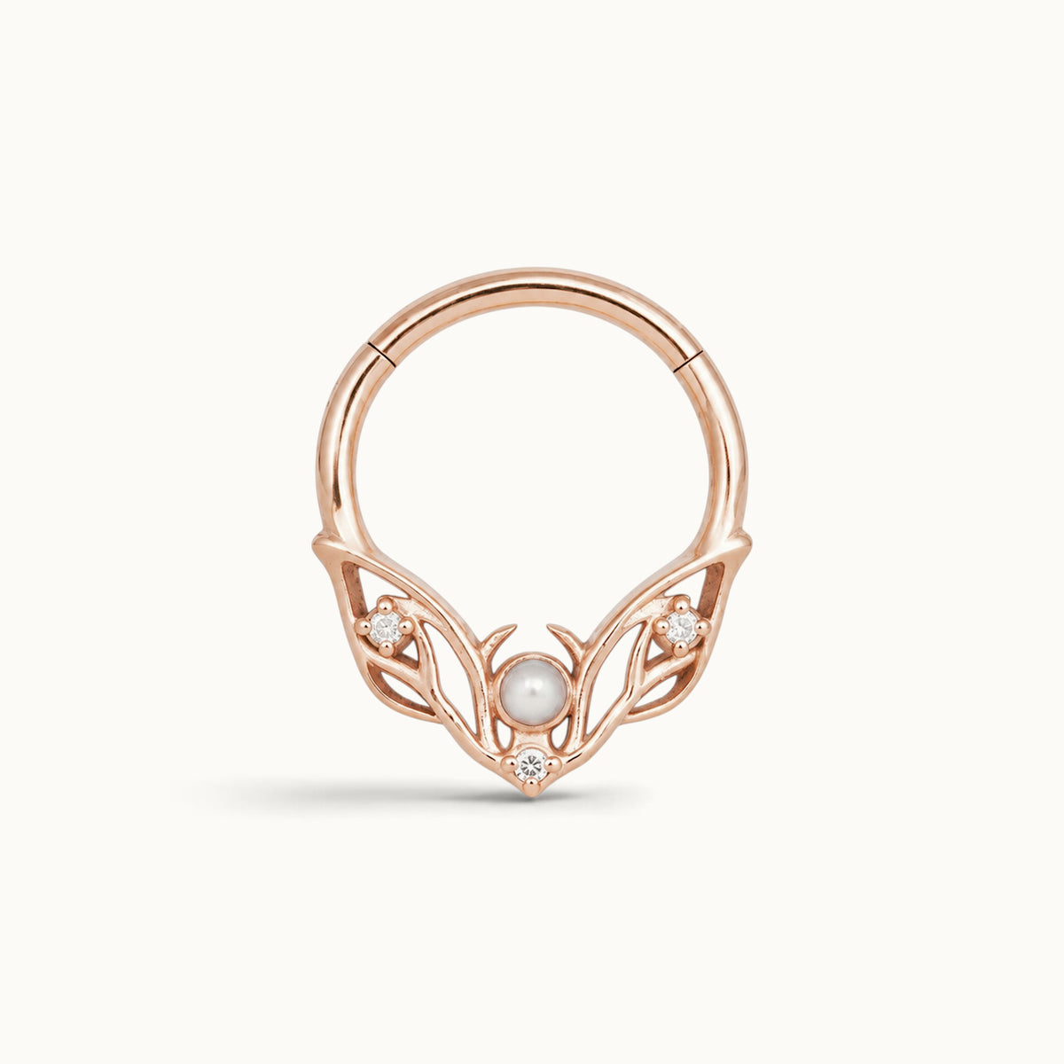 Rose gold seamless hoop piercing jewelry with a pearl and diamonds in a leaf design