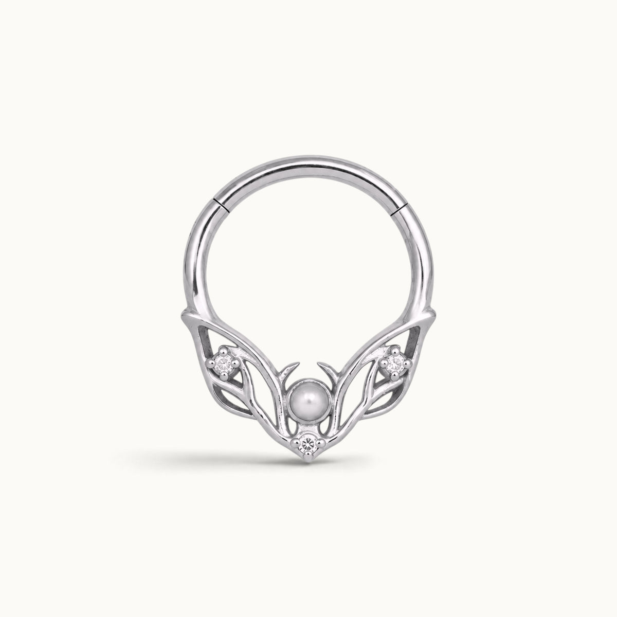 Silver septum ring with an ornate wing design, featuring a central pearl and small diamonds