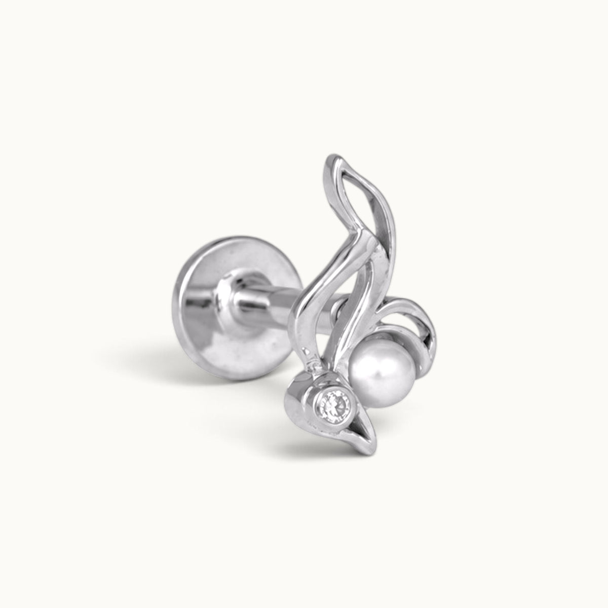 Elegant silver piercing stud with a musical note design featuring a pearl and a diamond.