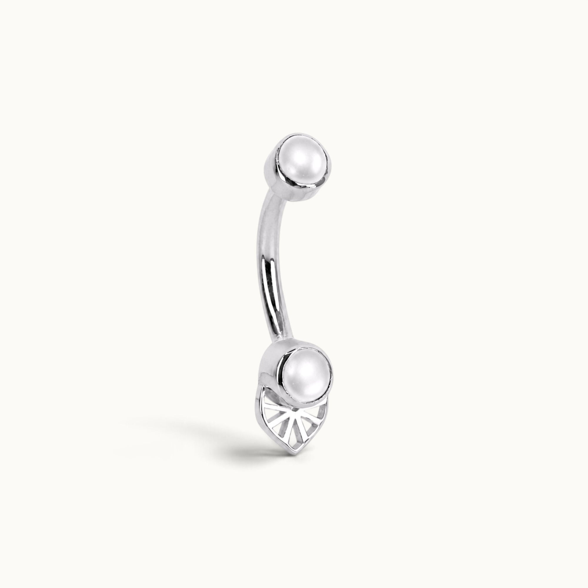 Elegant 18k gold navel piercing with pearl and leaf design, luxury body jewelry for timeless style