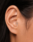 Delicate sword-shaped 18k gold ear piercing jewelry, handmade luxury body accessory for elegant style