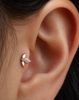 Rose gold leaf ear piercing with diamond accent, luxury 18k gold jewelry for elegant style