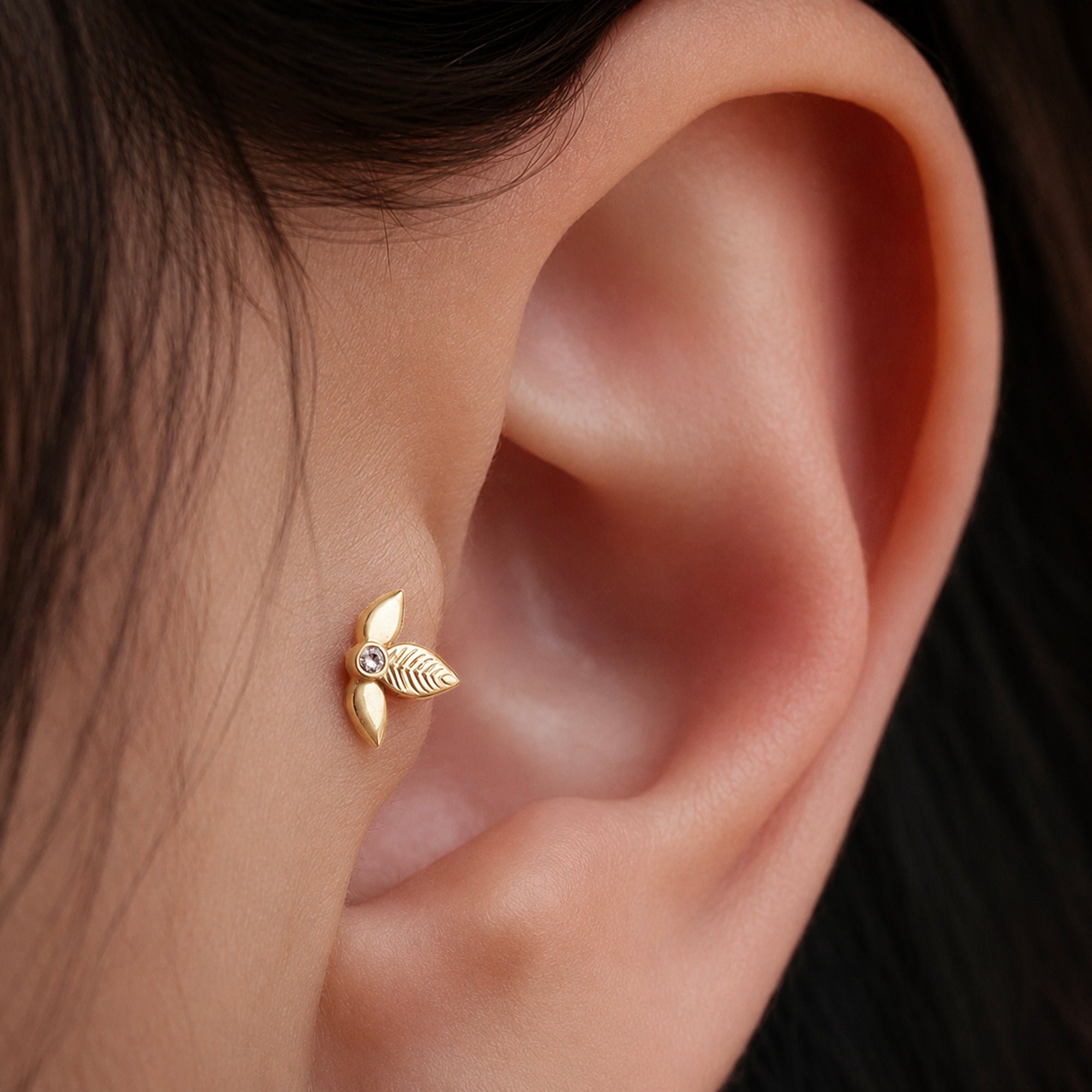 18k gold leaf ear piercing with diamond accent, luxury handmade body jewelry for elegant style