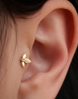 18k gold leaf ear piercing with diamond accent, luxury handmade body jewelry for elegant style